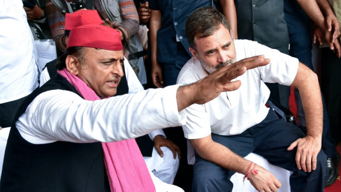 Congress leader Rahul Gandhi (right) in conversation with Samajwadi Party Chief Akhilesh Yadav (left) during a joint election rally in Prayagraj on 19 May, 2024 | Credit: ANI