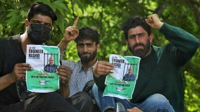 Supporters at a roadshow for Engineer Rashid in Baramulla, addressed by his son Abrar, during the Lok Sabha election campaign | Praveen Jain | ThePrint