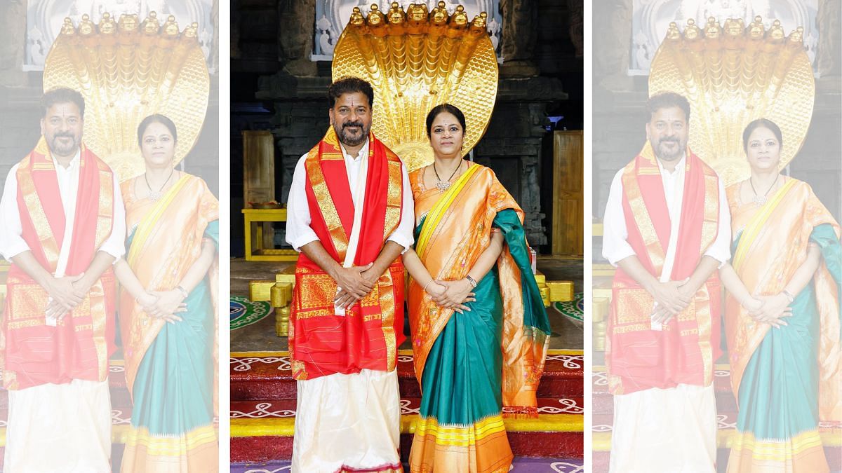 Telangana CM Revanth Reddy with his wife Geetha at the Venkateswara Swamy Temple | ANI 