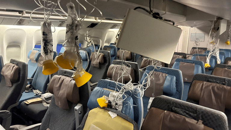 Singapore flight probe finds altitude drop & change in gravitational force caused injuries