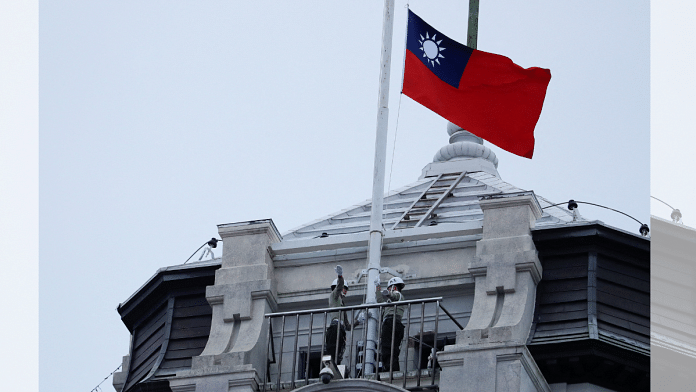 Honor guards raising a Taiwanese flag at the Presidential Palace | File photo | Credit: Reuters