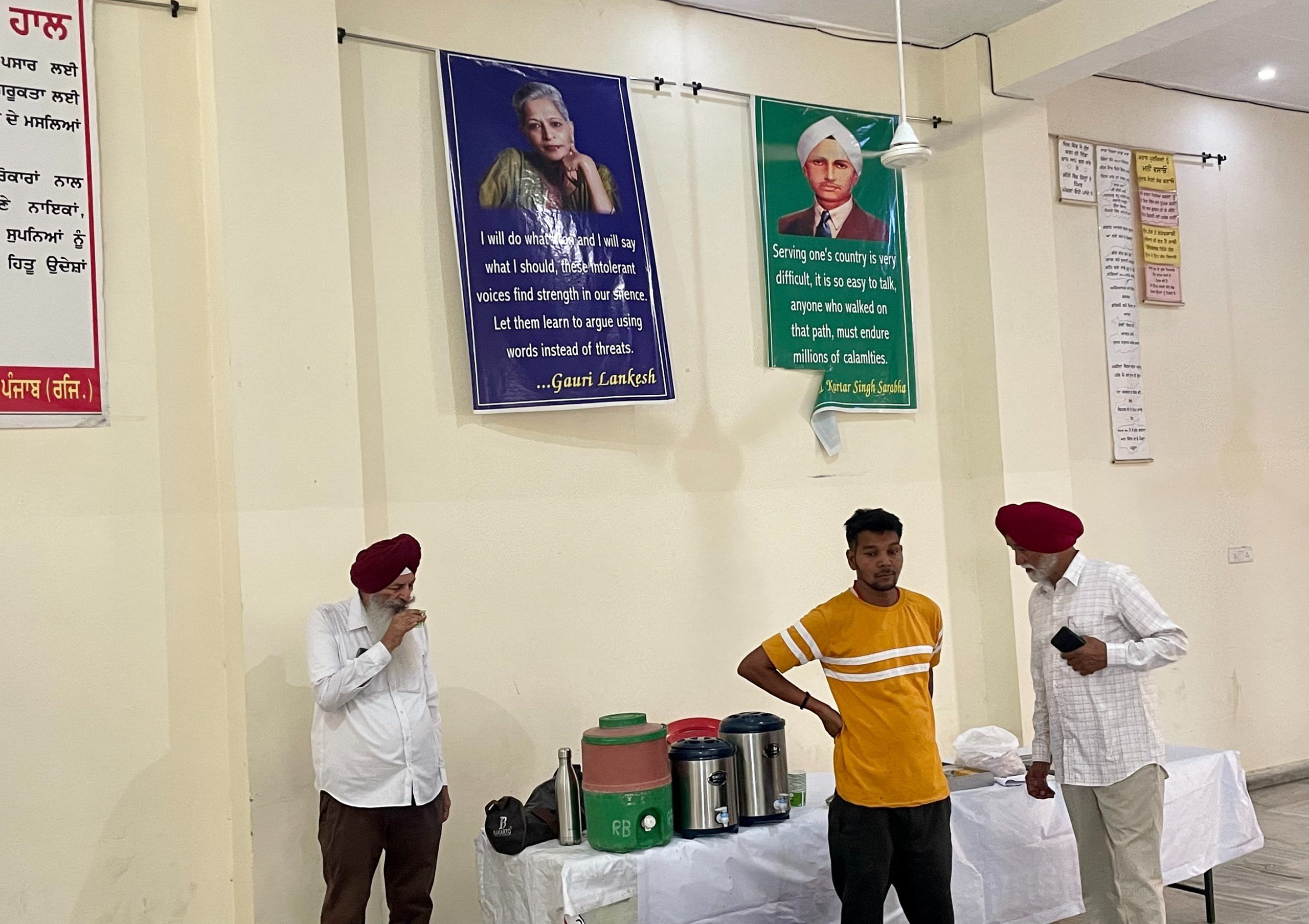 Members of the Barnala zone of rationalists cool off amid a meeting at the head-office on Sunday. Posters of Gauri Lankesh and Kartar Singh Sarabha, among others, adorn the walls | Sabah Gurmat, ThePrint