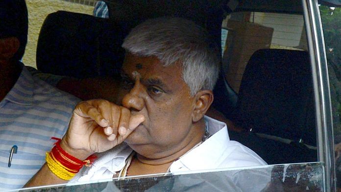 Janata Dal (Secular) Holenarasipura MLA HD Revanna, who was arrested on charges of kidnapping case linked to the 'obscene video' case, leaves after meeting with his father and former Prime Minister HD Deve Gowda after being released from Parappana Agrahara Jail, in Bengaluru on Tuesday. He was granted conditional bail by a special court of people's representatives concerning the case | ANI