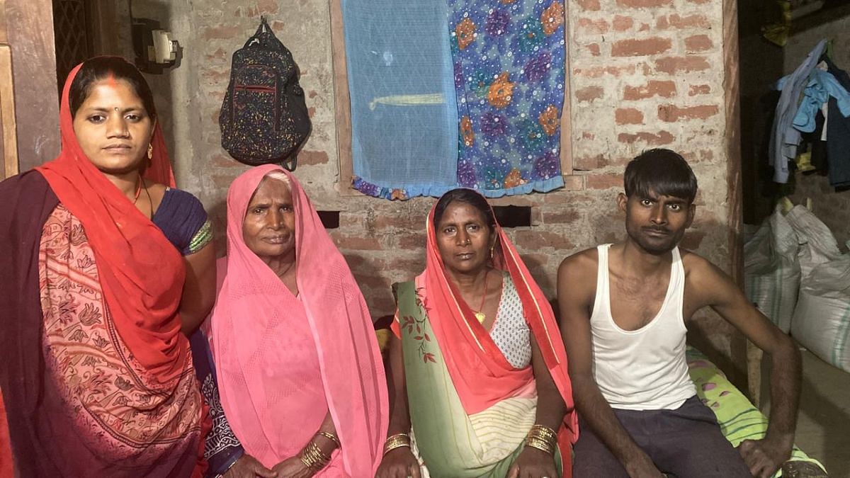 Vinay Kumar with his family in Mattepur village in Amethi’s Tiloi area | Photo: Shikha Salaria, ThePrint