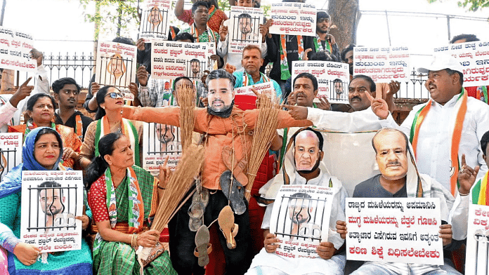 Congress supporters stage a protest demanding the arrest of Janata Dal (Secular) MP Prajwal Revanna in Bengaluru | ANI