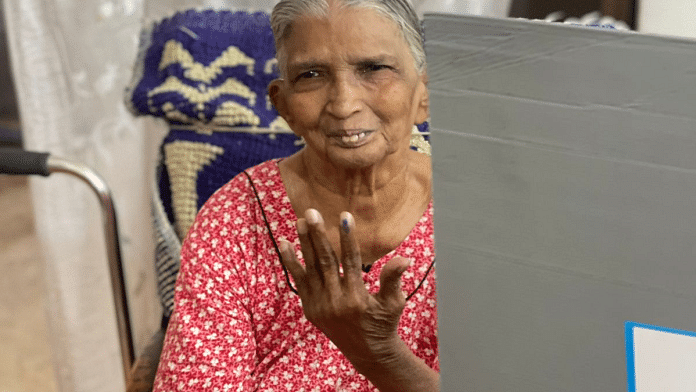 An elderly woman using the home voting facility in West Delhi | X (formerly Twitter)/ @CeodelhiOffice