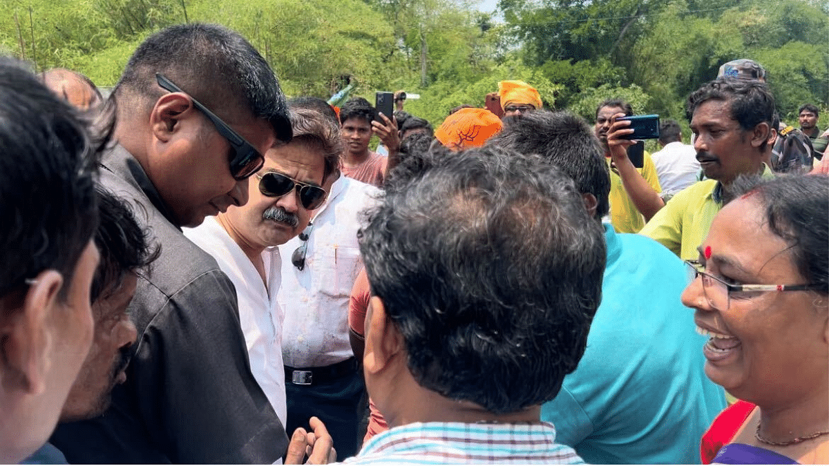 BJP candidate Abhijit Gangopadhyay listens to people in Tamluk | Sreyashi Dey | ThePrint