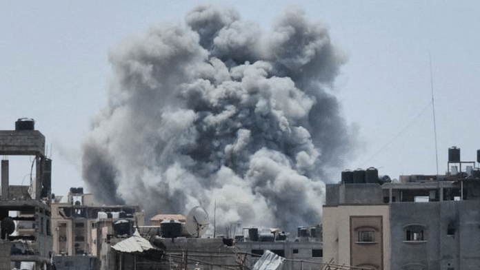 Smoke rises following an Israeli strike, amid the ongoing conflict between Israel and the Palestinian Islamist group Hamas, in Jabalia refugee camp in the northern Gaza Strip, May 18, 2024. Reuters/Rami Zohod/File Photo