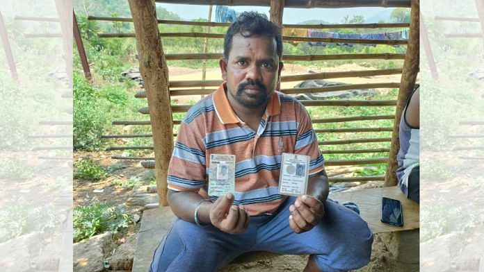 A voter in the Kotia cluster of disputed villages shows his two voter ID cards | Prasad Nichenametla | ThePrint