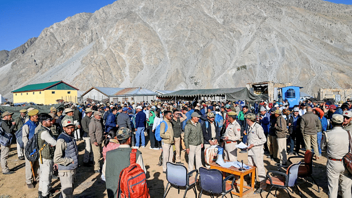 Polling officials prepare to leave for their polling stations on the eve of the fifth phase of the Lok Sabha polls, at Kargil on Sunday | ANI