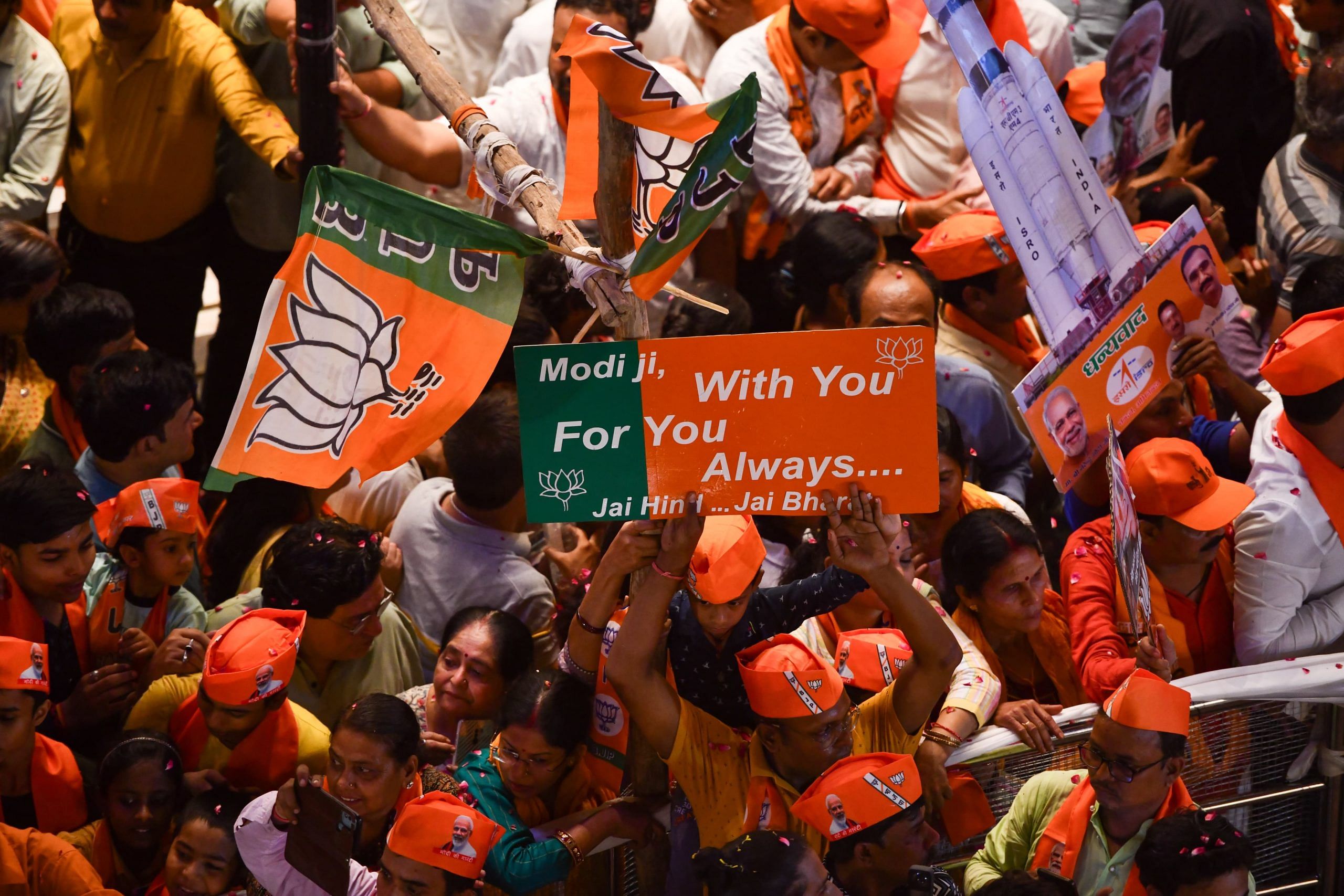 A supporter with ‘With you for you always’ placard | Suraj Singh Bisht | ThePrint