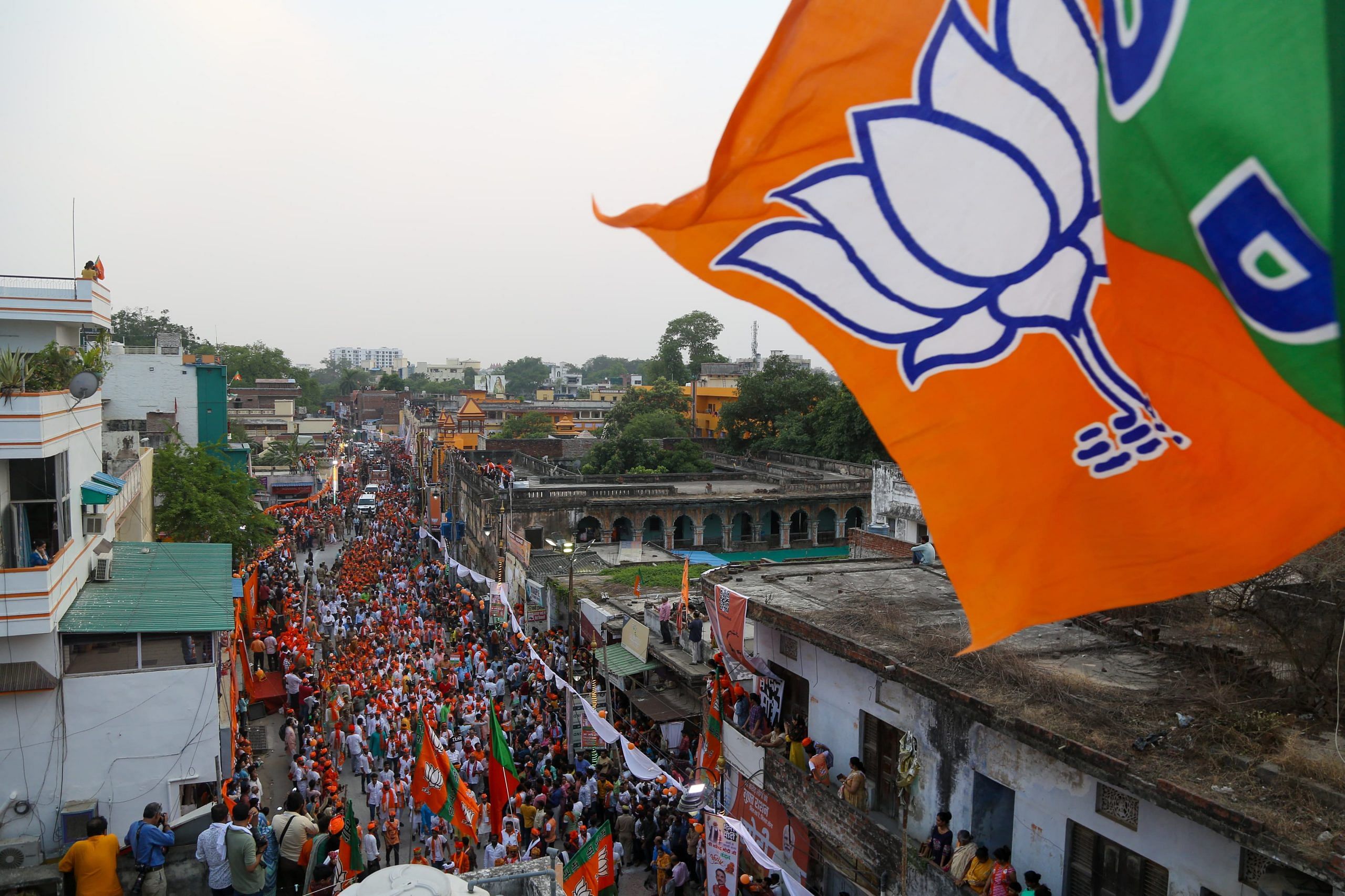 A sea of supporters showering Modi with flowers during the procession | Suraj Singh Bisht | ThePrint