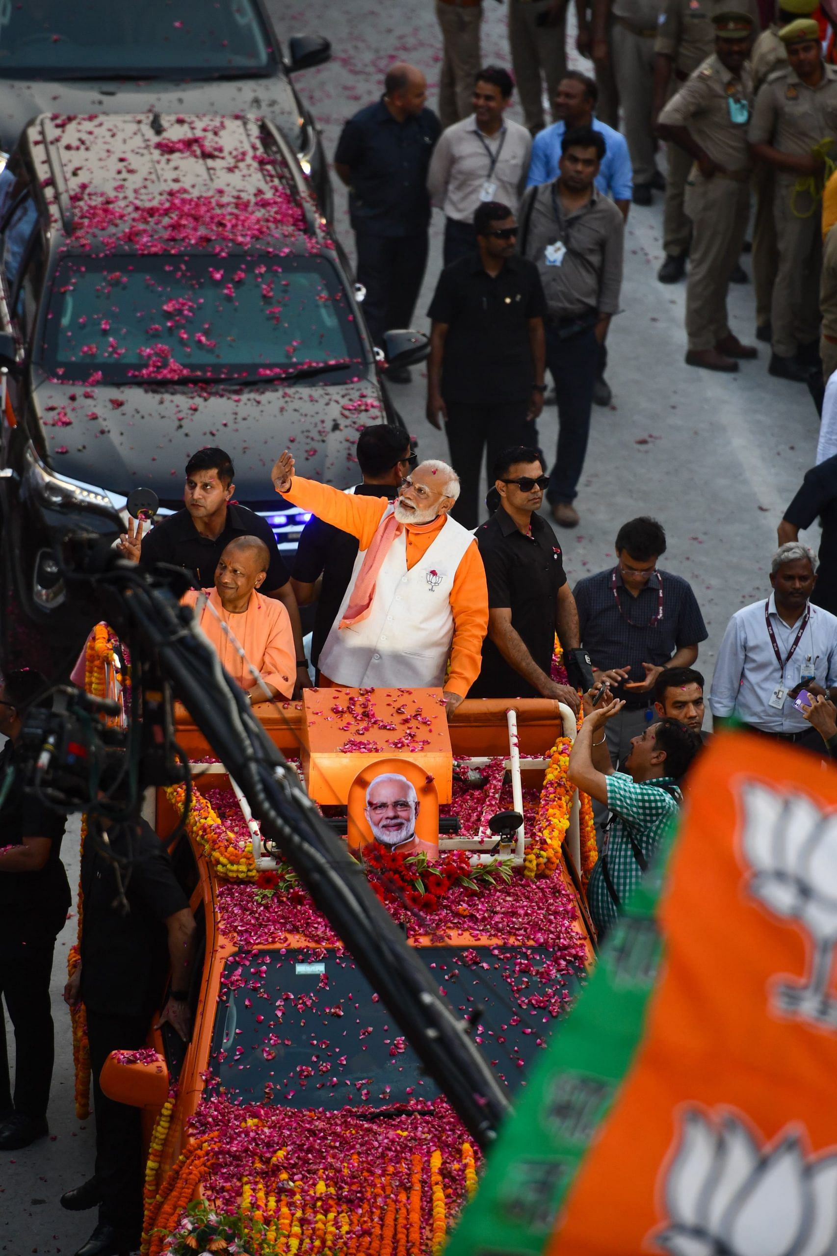 Modi greeting an exuberant crowd during the roadshow | Suraj Singh Bisht | ThePrint