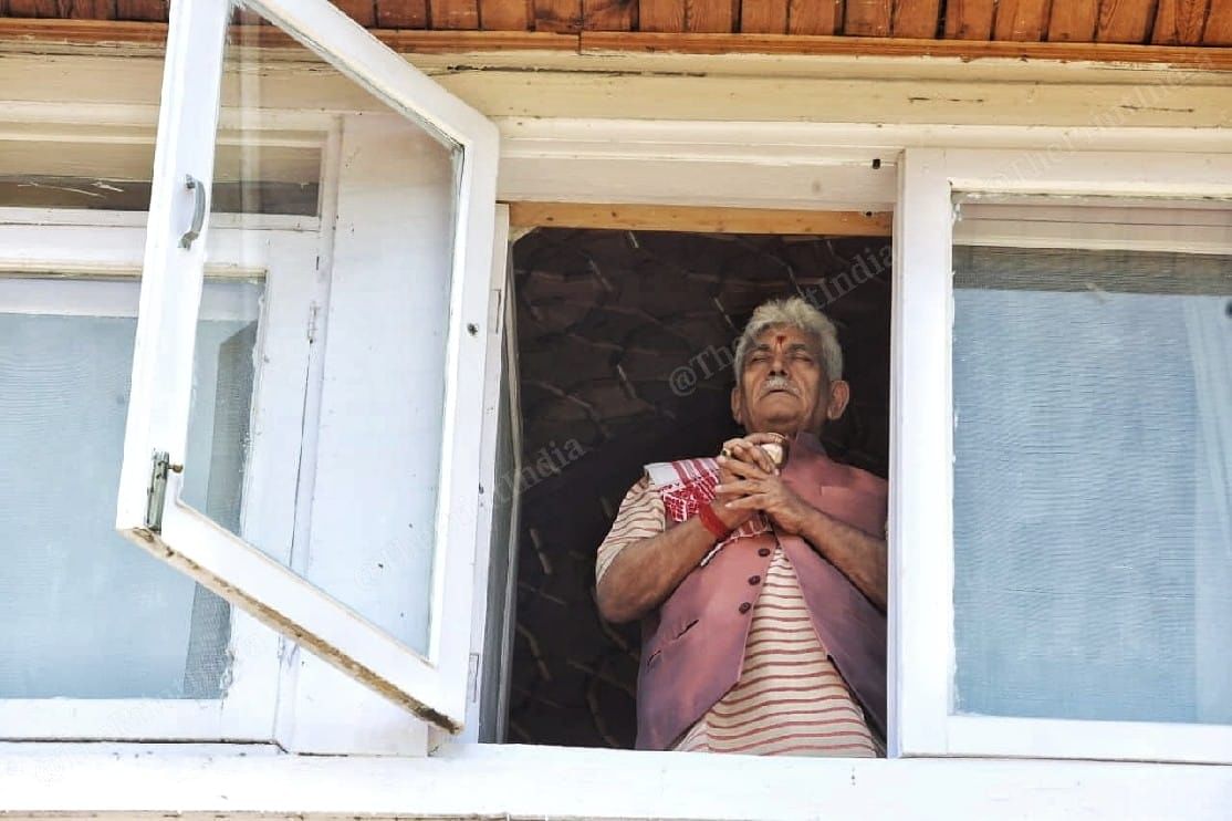 Lieutenant Governor of Jammu and Kashmir Manoj Sinha offering jal to sun at his residence | Praveen Jain | ThePrint