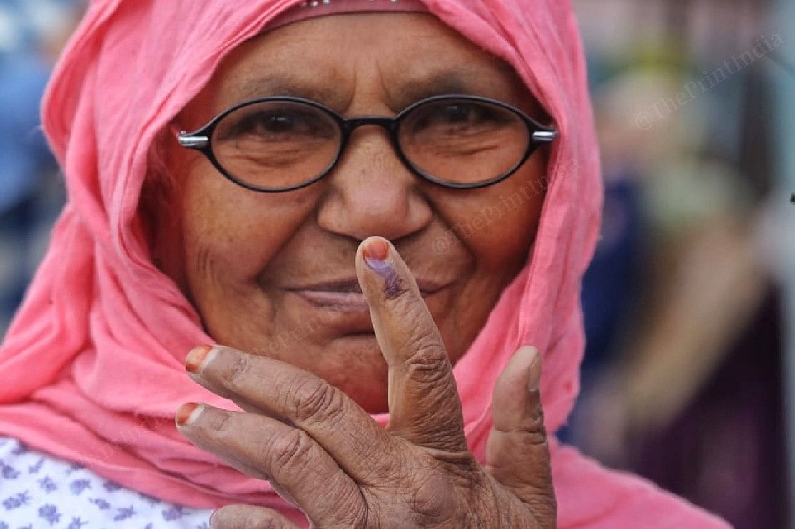 A woman voter showing her inked finger in Pulwama | Praveen Jain | ThePrint