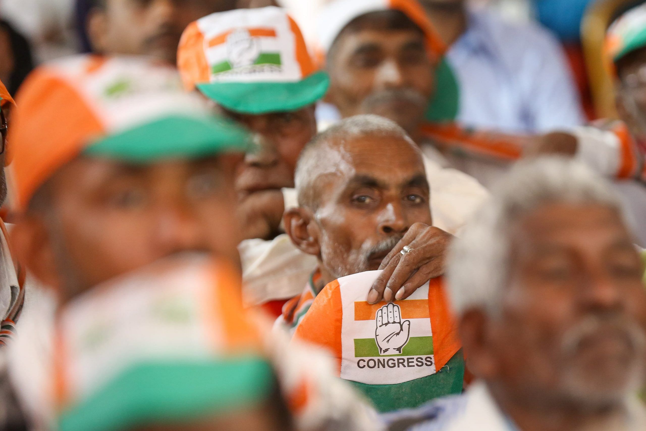 An old man with the Congress flag | Suraj Singh Bisht | ThePrint 