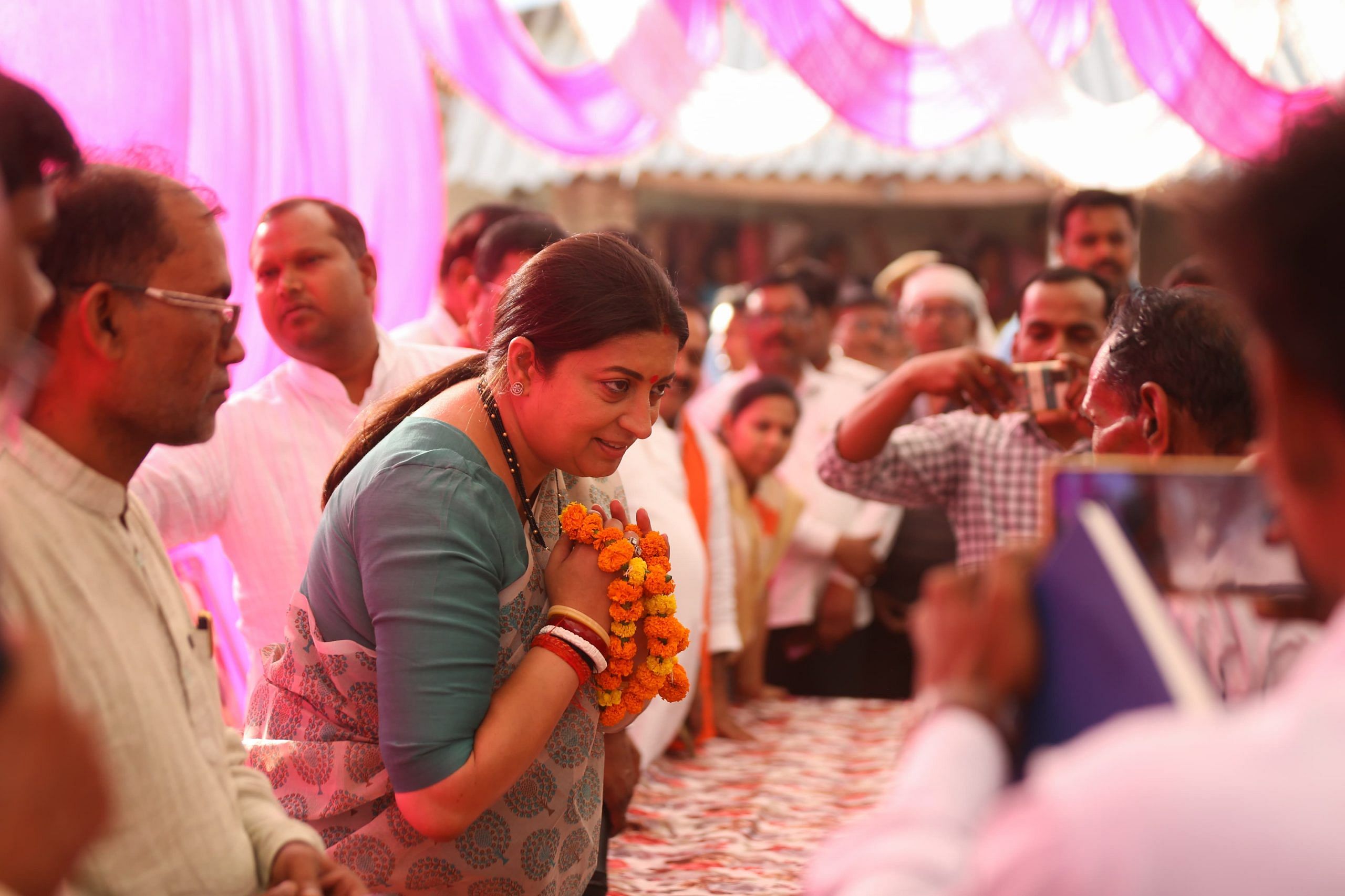 Irani greeting people at the venue | Suraj Singh Bisht | ThePrint