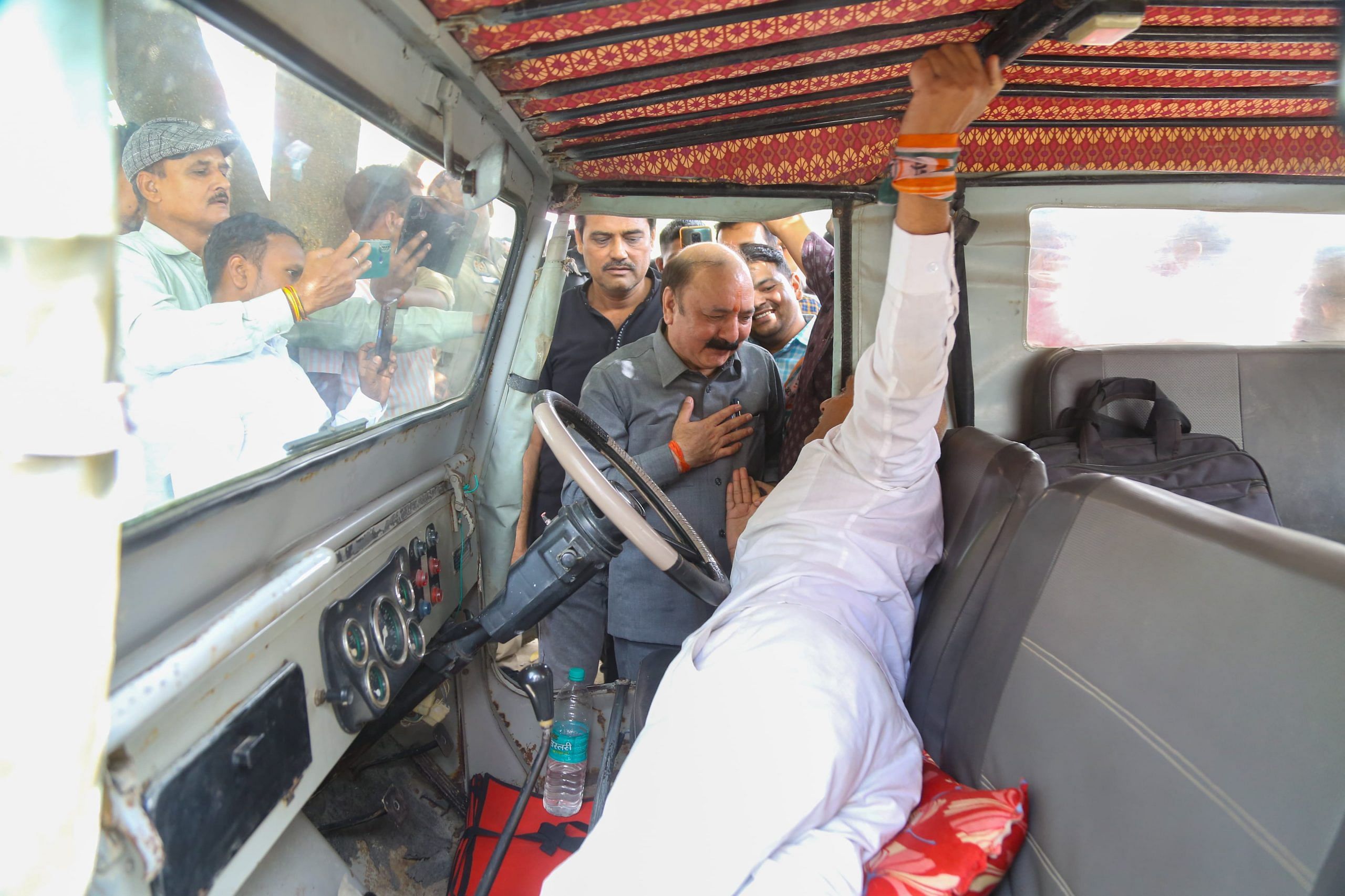 Kishori Lal Sharma greeting people on his way to a public gathering | Suraj Singh Bisht | ThePrint