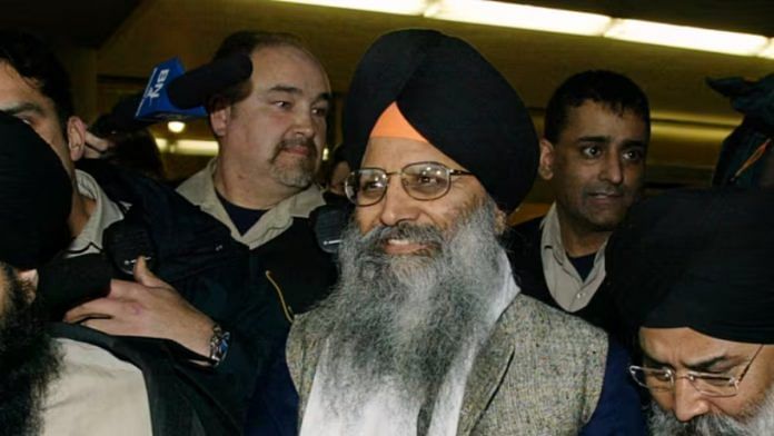 Ripudaman Singh Malik, in grey, smiles as he leaves B.C. Supreme Court in Vancouver in 2005 after being acquitted in the 1985 Air India bombing | Lyle Stafford/REUTERS