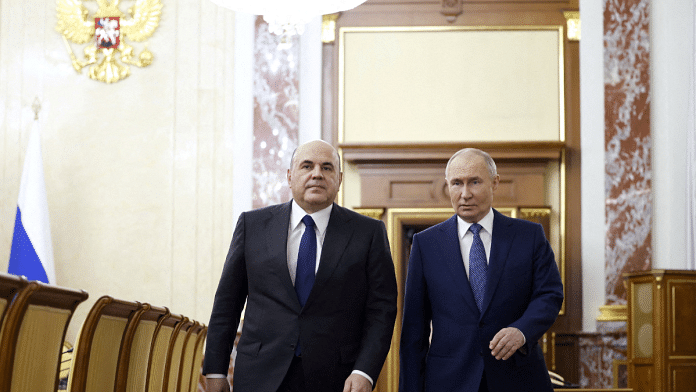 Russian Prime Minister Mikhail Mishustin (left) and President Vladimir Putin (right) | File Photo | Credit: Reuters