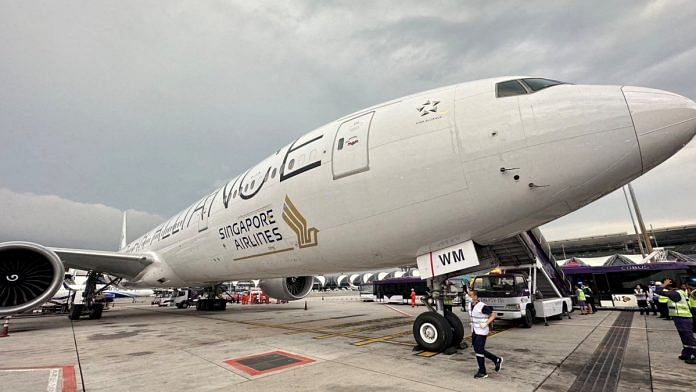 A Singapore Airlines aircraft is seen on tarmac after requesting an emergency landing at Bangkok's Suvarnabhumi International Airport, Thailand, May 21, 2024 | Handout via Reuters