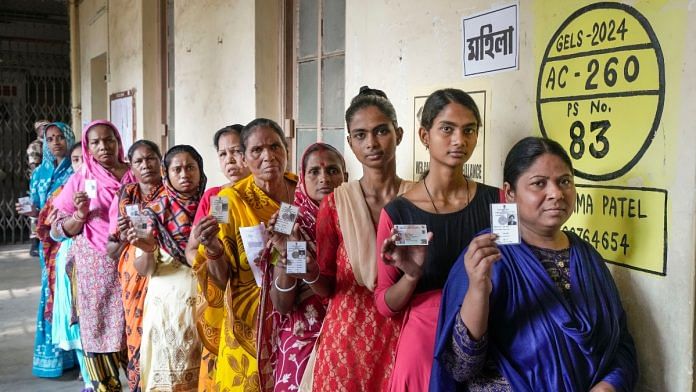 Women show their ID cards as they arrive to cast their votes for the fourth phase of Lok Sabha elections, in Bardhaman, Monday, May 13, 2024 | PTI