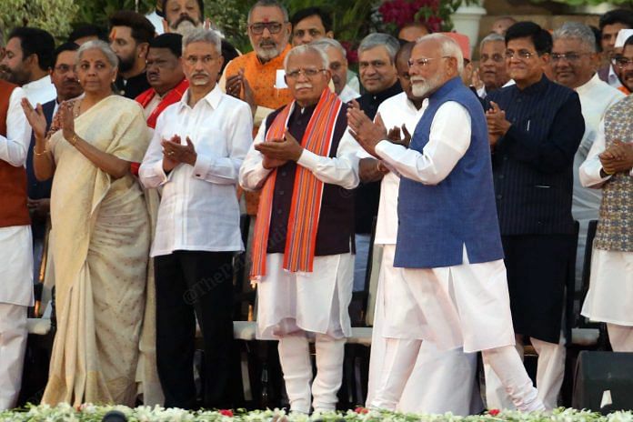 PM Narendra Modi along with his ministers at Rashtrapati Bhavan for swearing-in ceremony on Sunday | Praveen Jain | ThePrint