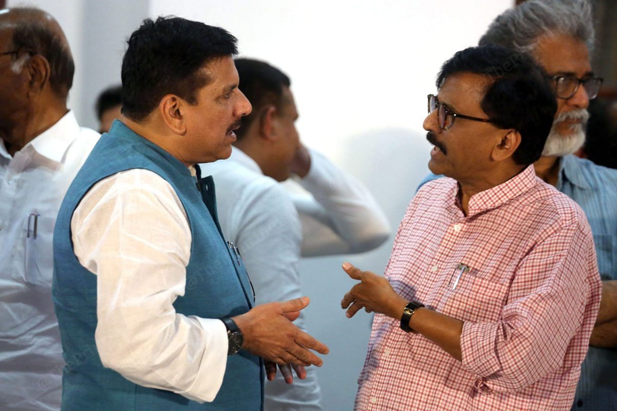 AAP leader Sanjay Singh talks to Shiv Sena leader Sanjay Raut after the INDIA alliance meeting in New Delhi | Praveen Jain | ThePrint