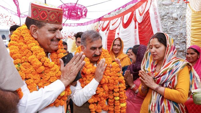Himachal Pradesh Chief Minister Sukhvinder Singh Sukhu with assembly by-election Congress candidate from Sujanpur Ranjit Singh Rana (left) during an election campaign, in Sujanpur on 17 May | ANI Photo