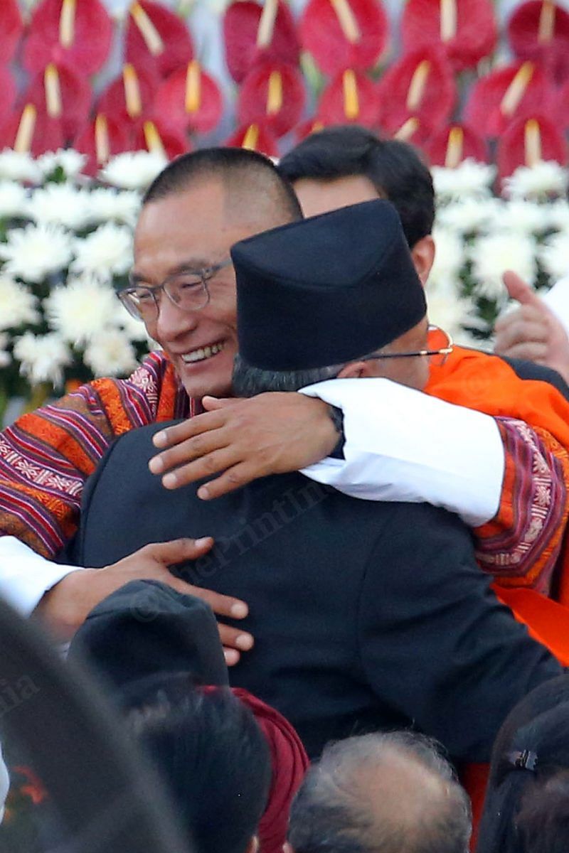 Bhutan PM Tshering Tobgay hugs Nepal PM Pushpa Kamal Dahal during a Swearing-in ceremony | Praveen Jain | ThePrint