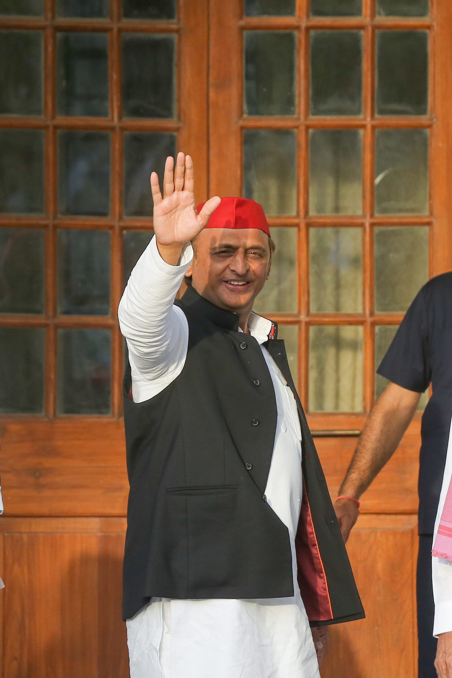 National president of the Samajwadi Party Akhilesh Yadav waves to the media | Suraj Singh Bisht | ThePrint