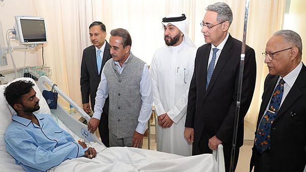 Union Minister of State (MoS) for External Affairs Kirti Vardhan Singh meets an injured Indian in Kuwait's hospital | Image: X/@indembkwt