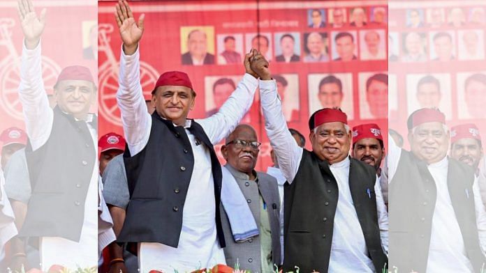 SP chief Akhilesh Yadav with Awadhesh Prasad, the Dalit candidate who went on to win from Faizabad, at a campaign rally in Ayodhya on 15 April, 2024 | ANI