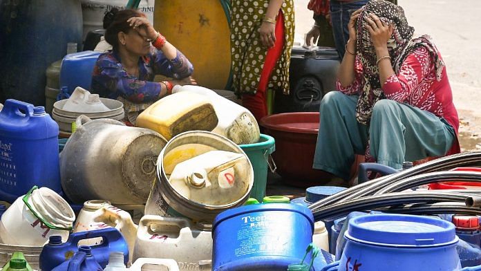 Representational image: Women waiting to collect water from a water tanker in Delhi | ANI