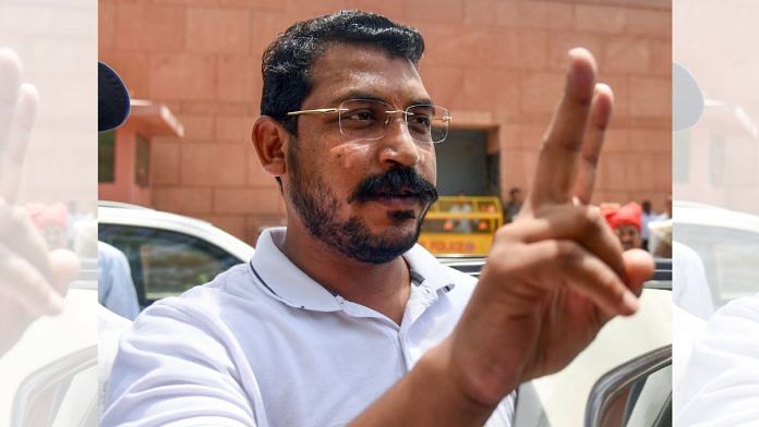 Newly elected Azad Samaj Party (Kanshi Ram) MP Chandrashekhar Azad shows a victory sign as he leaves the Parliament building in New Delhi Friday | ANI