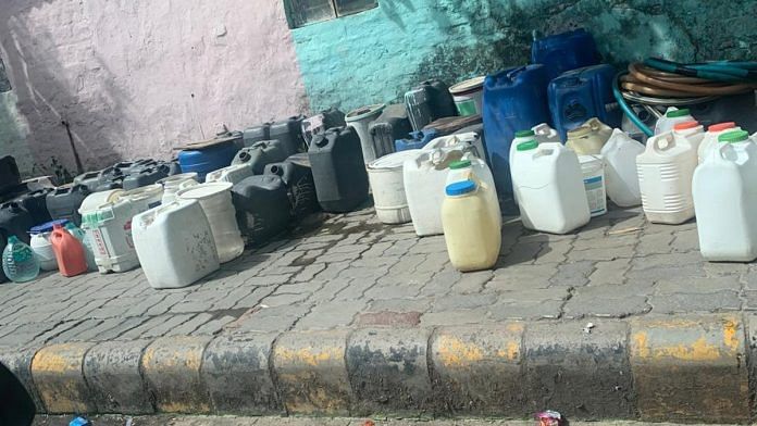 Containers kept in anticipation of water tanker at Jamrudpur in Delhi | Manavi Sharma for ThePrint