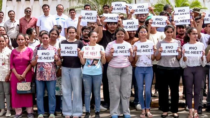 File photo: Students protesting against the NEET-UG re-exam | ANI