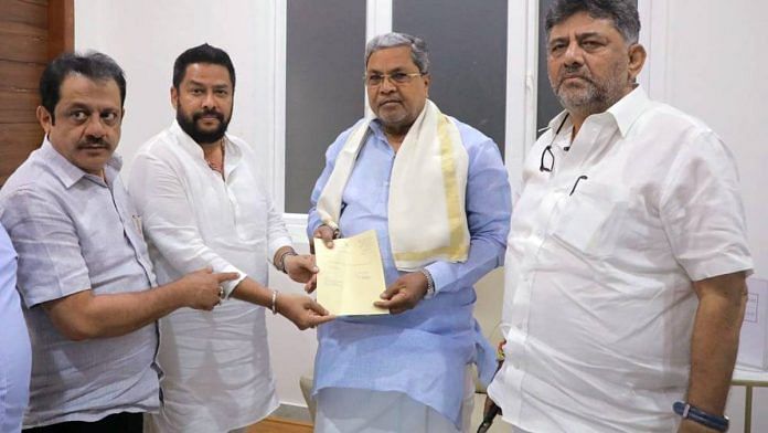 Karnataka minister B. Nagendra submitting his resignation to CM Siddaramaiah and Dy CM DK Shivakumar in Bengaluru, Thursday | ANI