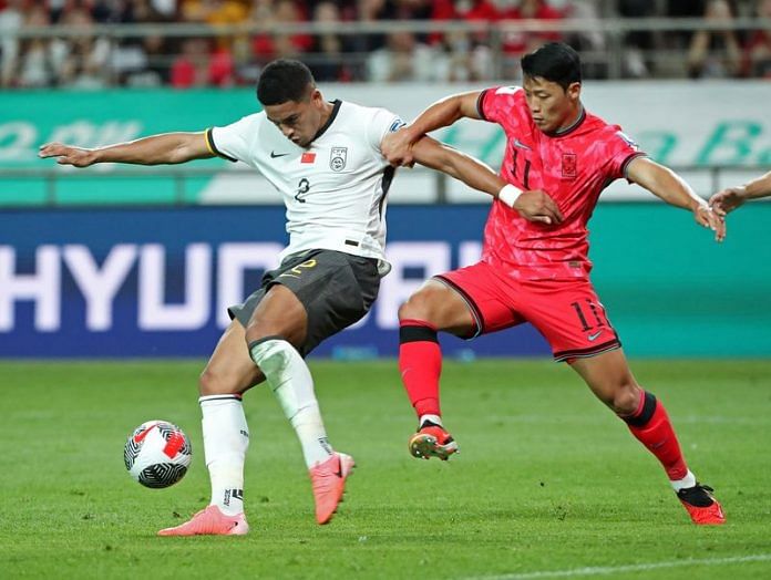 Soccer-Chinese keep World Cup qualifying hopes alive despite Korea ...