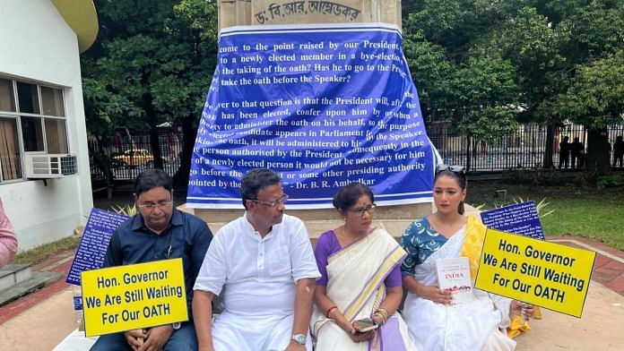 TMC MLAs sitting with placards outside Vidhan Sabha | By Special Arrangement