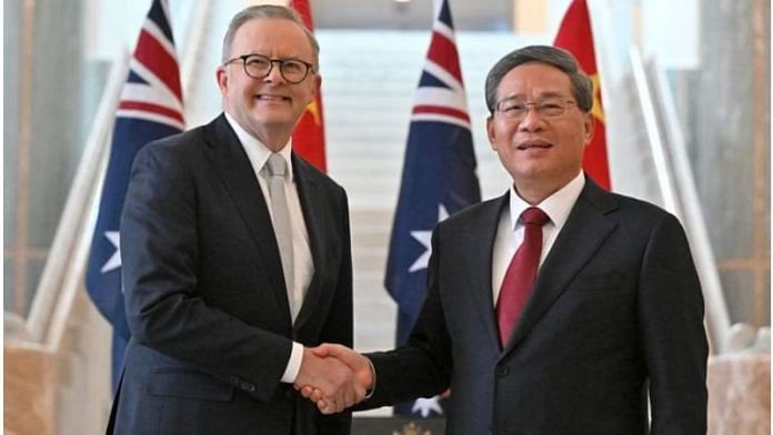 Australian Prime Minister Anthony Albanese with Chinese Premier Li Qiang | Photo: Reuters