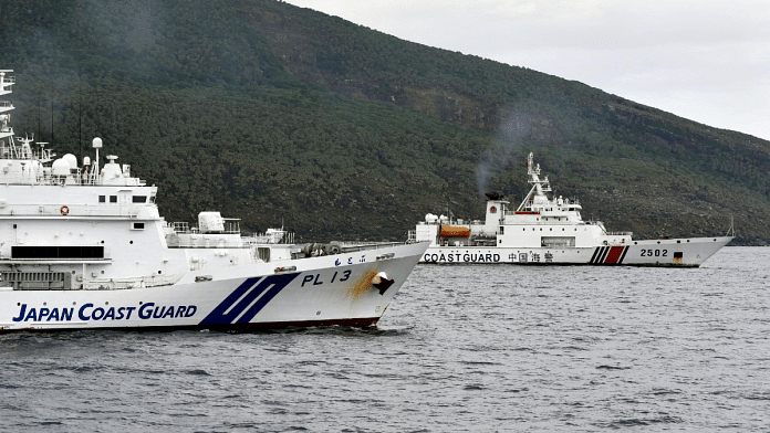 A China Coast Guard vessel No.2502 sails near a Japan Coast Guard vessel Motobu off Uotsuri Island, one of a group of disputed islands called Senkaku Islands in Japan, also known in China as Diaoyu Islands, in the East China Sea April 27, 2024, in this photo released by Kyodo. Mandatory credit Kyodo via Reuters | File Photo