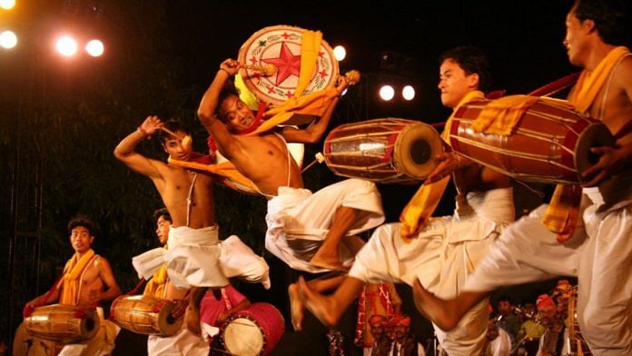 Manipuri dancers with traditional drums, representing ethnic communities of Manipur