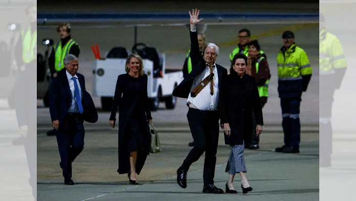 WikiLeaks founder Julian Assange waves as he arrives in Canberra on 26 June | Reuters/Edgar Su