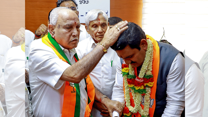 File photo of former Karnataka chief minister and senior BJP leader B.S.Yediyurappa with his son Vijayendra | ANI File