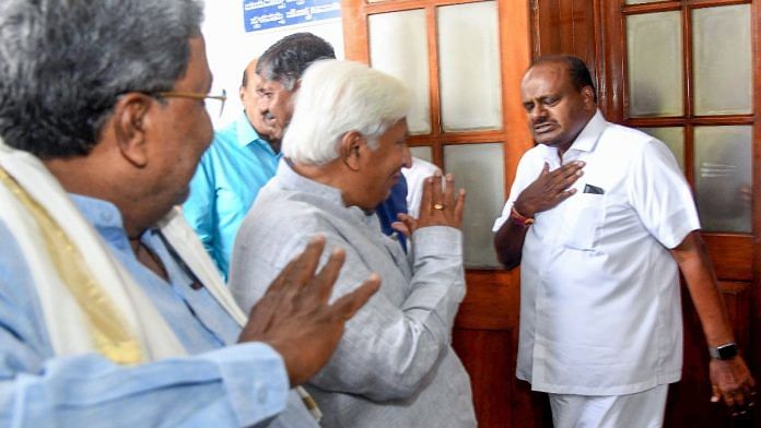 Karnataka Chief Minister Siddaramaiah greets JD(S) leader H D Kumaraswamy, at Vidhana Soudha in Bengaluru Monday. | ANI