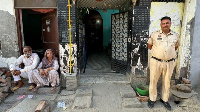Police personnel stationed outside the house of Anil Rajput after Komal was killed by her minor brother. | Sagrika Kissu | ThePrint