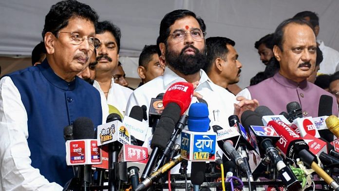 Maharashtra Chief Minister Eknath Shinde addresses a press conference in presence of State Deputy Chief Minister and Finance Minister Ajit Pawar and Minister of State Deepak Kesarkar during the Budget Session of the State Assembly, in Mumbai on Friday | ANI