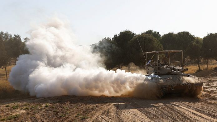 An Israeli tank manoeuvres, after returning from the Gaza Strip, amid the ongoing conflict between Israel and Hamas, near the Israel-Gaza border, in Israel, June 5, 2024 | Reuters