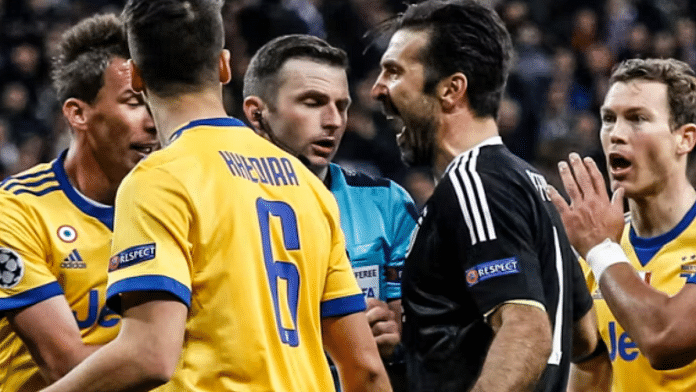 Referee Michael Oliver (in blue) is abused by Juventus goalkeeper Gianluigi Buffon during a 2018 Champions League tie | Representative Image | Reuters